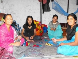 Women from Entire Power in Social Action (a disabled women's organization) working on crafts.