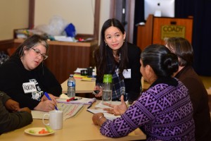 Dr. Thuy Nguyen talks with participants of the workshop